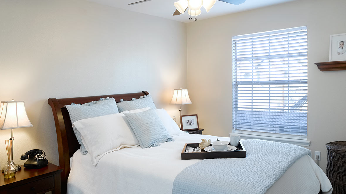 collier-park-10-1 - Collier Park Interior shot of a Collier Park bedroom, featuring lots of natural light and comfortable furnishings.